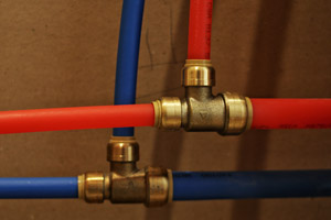 Red and blue PEX plumbing. D&F Plumbing, Heating and Cooling provides plumbing repiping services in Portland OR and Vancouver WA.