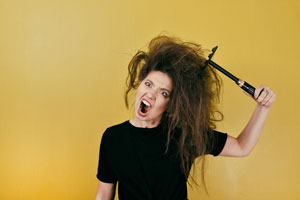 Frizzy hair. D&F Plumbing, Heating and Cooling, serving Portland OR & Vancouver WA explains the 7 warning signs of hard water and if you need a water softener.