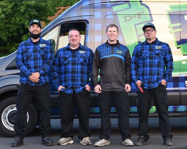 D and F Plumbers group photo in front of work van in Portland OR