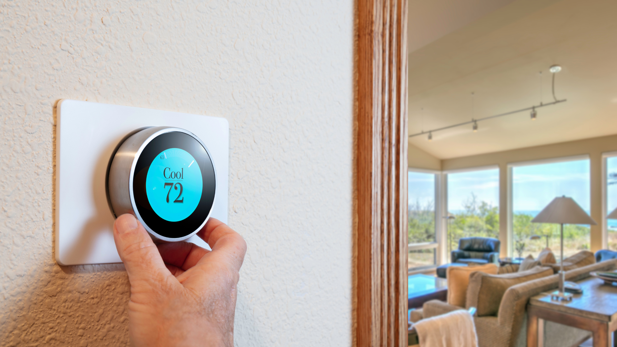 Homeowner adjusting smart thermostat