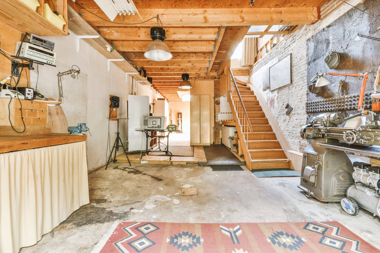 Interior of modern laundry room with white walls