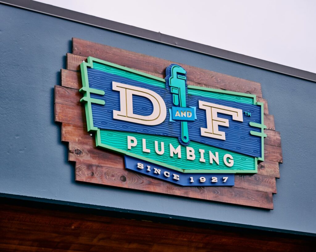 D&F Plumbing "Since 1927" sign on the company headquarters