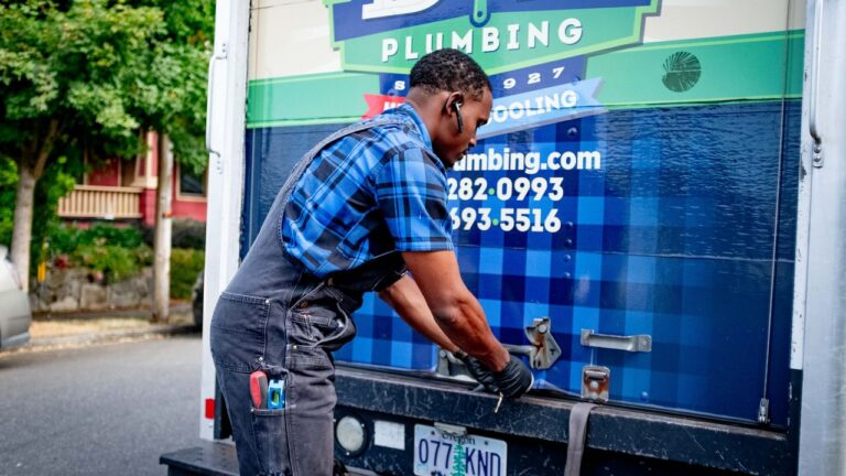 D&F technician pulling equipment from a service truck